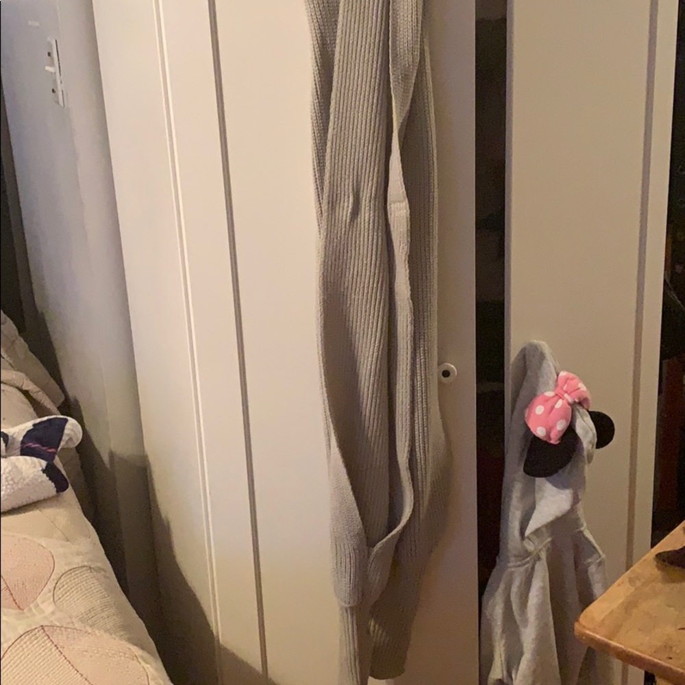 Gray scarf that turns into a sweater